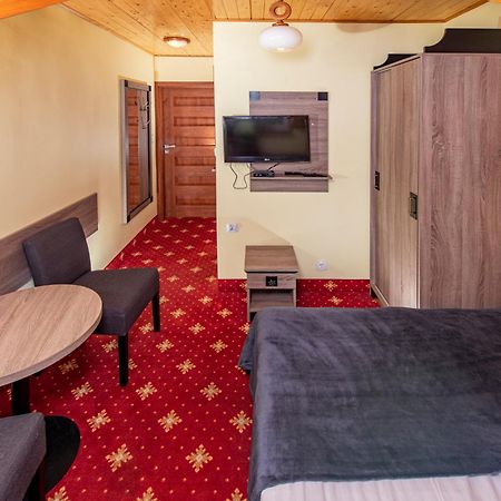Domki, Apartamenty I Restauracja Wloczega Гонски Экстерьер фото